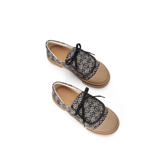 ANAGRAM JACQUARD FLAP SNEAKER